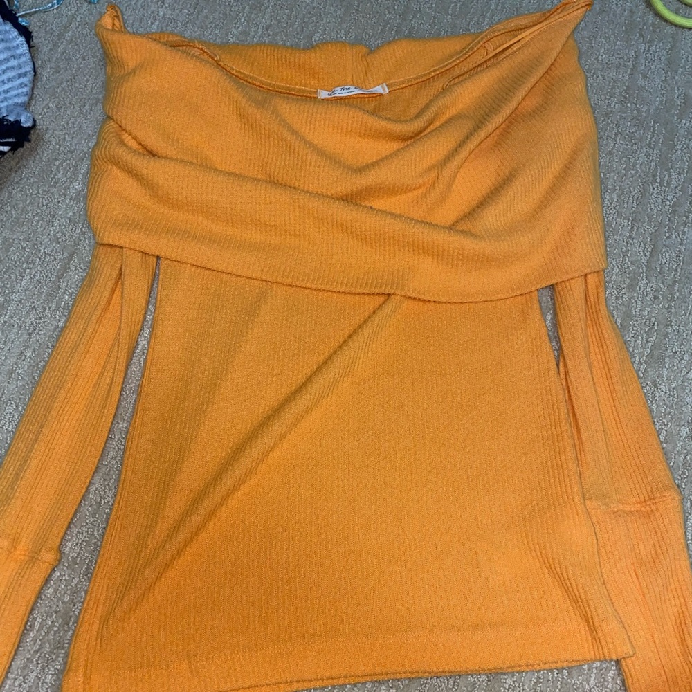 Free people brand new without tags. Orange top